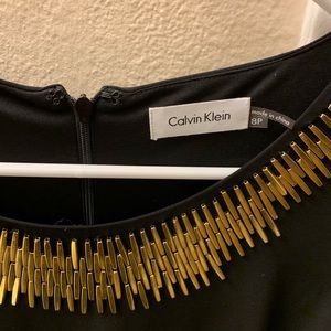 Calvin Klein Dresses - Calvin Klein Black Dress with gold detail Calvin Klein Dresses - Calvin Klein Black Dress with gold detail
